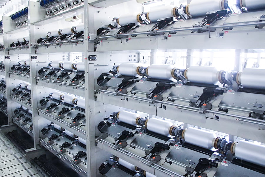 كيف تقارن تكلفة إنتاج خيوط FDY بأنواع الخيوط الأخرى